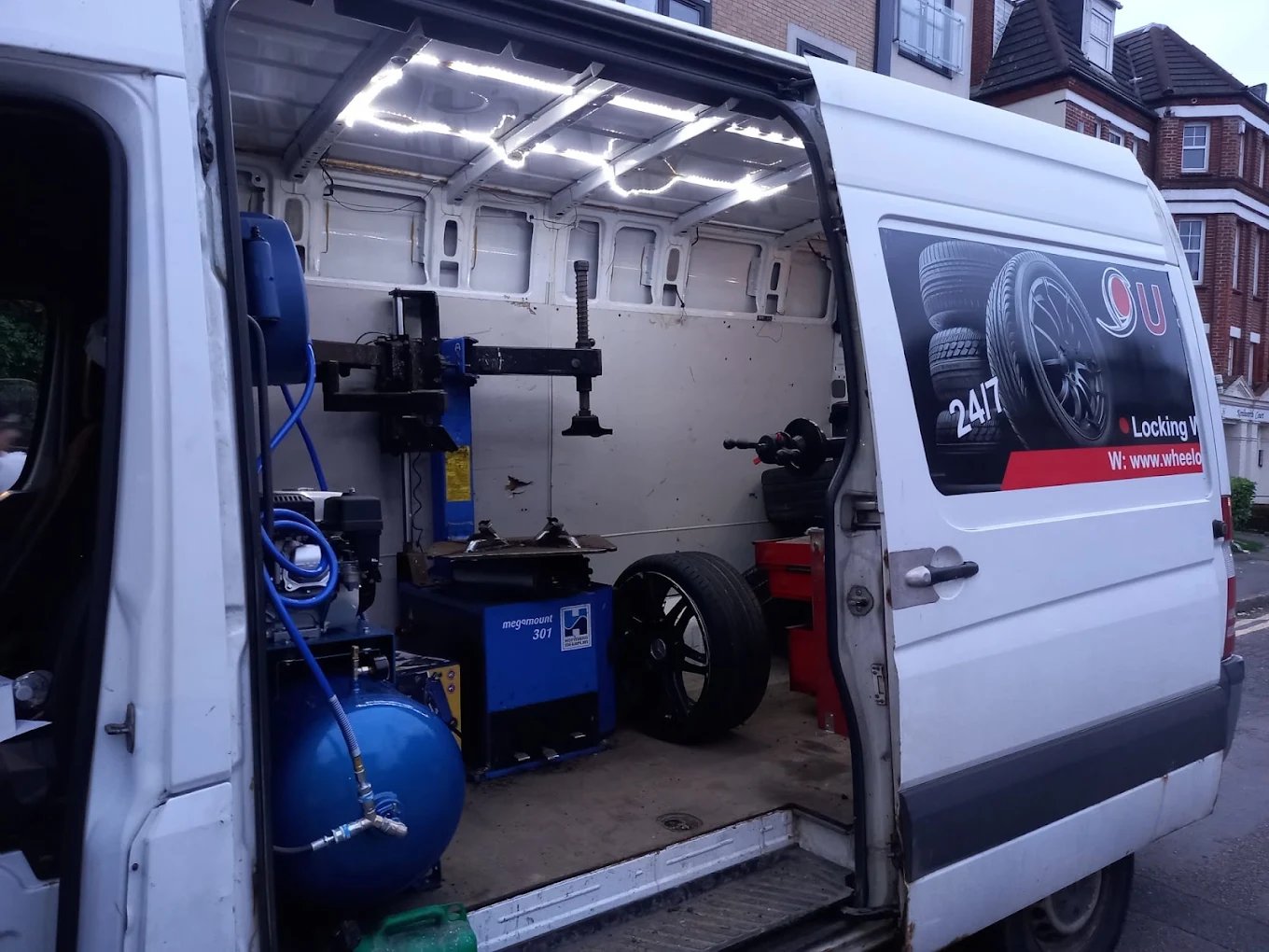 Mobile tyre fitting van on location